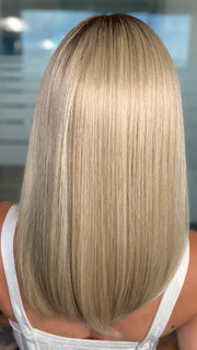Roxie wearing SLONE by RENE OF PARIS in BUTTERCREAM BLONDE R | Light Ash Blonde, Medium Honey Blonde, and Pale Gold Hues blended