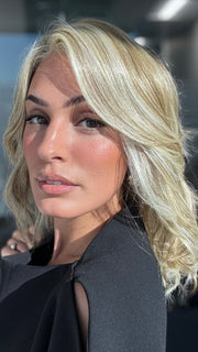ROXIE wearing wearing DAZZLING WAVEZ by RENE OF PARIS in CREAMY TOFFEE | Dark Blonde Evenly Blended with Light Platinum Blonde and Light Honey Blonde