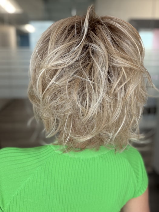 Roxie wearing FLAWLESS WAVES by TRESSALLURE in 19/23/R12 | A beautiful blend of Platinum Blonde and Pale Golden Blonde, shaded with Dark roots