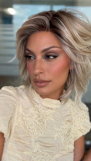 Roxie wearing BROADWAY by BELLETRESS in MILKSHAKE BLONDE R | A mixture of Light Sandy Brown, Highlighted with Light Ash Blonde with a Hint of Light Platinum Blonde with a Medium Root Color