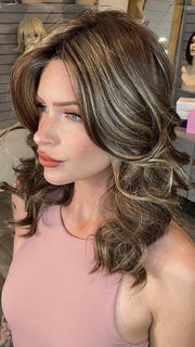 Madeline wearing ELLE by BELLETRESS in CAPPUCINO LATTE R | A Deep brunette with light brown highlights and lowlights