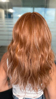 Roxie wearing FRANKY by RENE OF PARIS in CARAMEL COPPER | One‑tone Caramel Copper shade enhanced with ultra‑fine Cream Blonde highlights