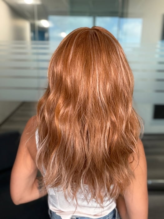 Roxie wearing FRANKY by RENE OF PARIS in CARAMEL COPPER | One‑tone Caramel Copper shade enhanced with ultra‑fine Cream Blonde highlights