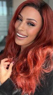 Roxie Wearing BROOKLYN by RENE OF PARIS in HENNA-RED-R | Bright and Vibrant Red with Cherry Undertones, Rooted with Rich Coffee Bean Brown