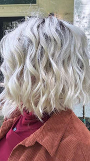 Marcie @wig.obsessed wearing HAVEN by ESTETICA in color SUNLIT-BLONDE | Soft Blend of Sandy Blonde, Lightest Blonde and Iced Blonde with a Light Golden Brown Root | outside lighting