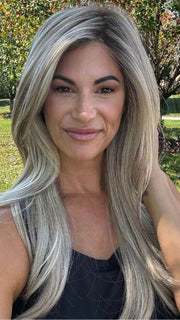 Katy C. @thewigeducator wearing MESMERIZED by RAQUEL WELCH WIGS in color RL19/23SS SHADED BISCUIT | Light Ash Blonde Evenly Blended with Cool Platinum Blonde with Dark Roots | outside lighting