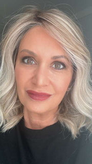 Emily H. @she_sheds_more wearing SIMMER by RAQUEL WELCH WIGS in color RL19/23SS SHADED BISCUIT | Light Ash Blonde Evenly Blended with Cool Platinum Blonde with Dark Roots