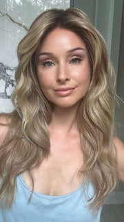 Heather Atkins @cjswigs wearing CALIFORNIA BEACH WAVES by TRESSALLURE in color 14/26/R10 | Red Blonde with Gold Blonde highlights and Light Brown roots
