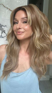 Heather Atkins @cjswigs wearing CALIFORNIA BEACH WAVES by TRESSALLURE in color 14/26/R10 | Red Blonde with Gold Blonde highlights and Light Brown roots
