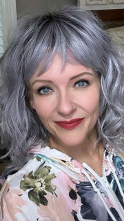 Marcie Mertz @wig.obsessed wearing BREEZY WAVEZ by RENE OF PARIS in color LUNAR-HAZE | Periwinkle Base with Off-Black Roots
