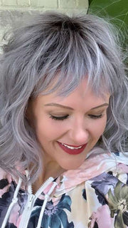 Marcie Mertz @wig.obsessed wearing BREEZY WAVEZ by RENE OF PARIS in color LUNAR-HAZE | Periwinkle Base with Off-Black Roots
