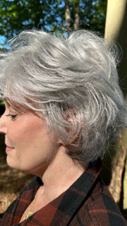 Mel B. @mels.be.ageless wearing VOLTAGE by RAQUEL WELCH WIGS in color RL51/61 ICED GRANITA | Lightest Grey Progresses to a Deep Grey at the Nape