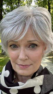 Mel B. @mels.be.ageless wearing VOLTAGE ELITE by RAQUEL WELCH WIGS in color R56/60 SILVER MIST | Lightest Gray with 20% Medium Brown Evenly Blended with Pure White