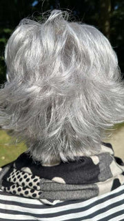 Mel B. @mels.be.ageless wearing VOLTAGE ELITE by RAQUEL WELCH WIGS in color R56/60 SILVER MIST | Lightest Gray with 20% Medium Brown Evenly Blended with Pure White