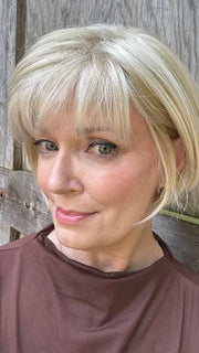 Mel B. @mels.be.ageless wearing CORY by NORIKO in color CREAMY BLONDE | Platinum and Light Gold Blonde evenly blended