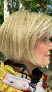 Mel B. @mels.be.ageless wearing CORY by NORIKO in color CREAMY BLONDE | Platinum and Light Gold Blonde evenly blended