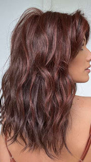 Jenna Fail @jenna_fail wearing BEACH WAVE MAGIC by TRESSALLURE in color 10/130R | Bright Red with Medium Brown roots