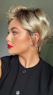 Olivia @oliviamcveigh_ wearing SPARKLE ELITE by RAQUEL WELCH WIGS in color SS14/88 SHADED GOLDEN WHEAT | Dark Blonde Evenly Blended with Pale Blonde Highlights and Dark Roots
