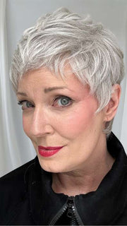 Mel B. @mels.be.ageless wearing STRAIGHT CHIC by RAQUEL WELCH WIGS in color RL56/60 SILVER MIST | Lightest Grey Evenly Blended with Pure White