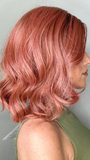 Kristyna @kristynamoore wearing PANACHE WAVEZ by RENE OF PARIS in color DUSTY-ROSE | Medium Coral Red Base with Dark Brown Roots