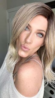 Kristyna @kristynamoore wearing LEONI by RENE OF PARIS in color MELTED MARSHMALLOW | Subtly Warm Dark Sandy Blonde Blend with Medium Brown Roots and Light Ash Blonde Tips and Highlights