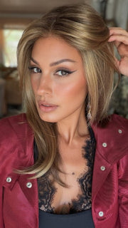 Roxie wearing BELINDA HAND-TIED by ENVY in TOASTED SESAME | Medium Brown roots with overall Warm Cinnamon base and Golden Blonde highlights
