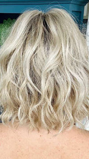 Mel B. @mels.be.ageless wearing JANUARY PETITE by JON RENAU in color FS17/101S18 PALM SPRINGS BLONDE | Light Ash Blonde with Pure White Natural Violet Bold Highlights, Shaded with Dark Natural Ash Blonde
