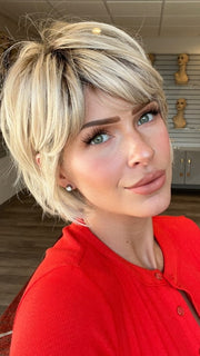Madeline wearing TOLEDO by BELLETRESS in CRUSHED ALMOND BLONDE R | A soft Neutral Light Blonde with a Light and Medium Blended Root Color.
