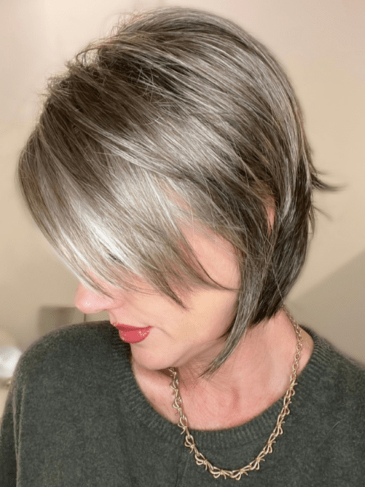 Jenny B. @thewiggygirl wearing REESE by NORIKO in color SANDY SILVER | Medium Brown Transitionally Blending to Silver and Dramatic Silver Bangs