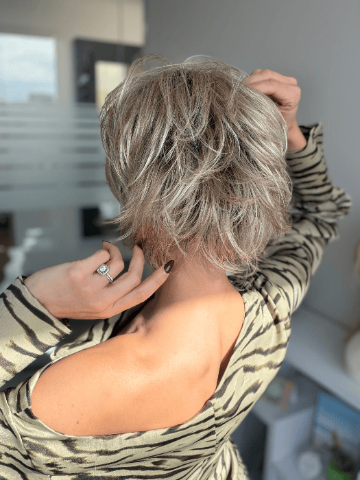 Model is wearing SKY in EXCLUSIVE COLOR ARABIAN SAND | Neutral Chocolate Brown Roots fade into a Neutral Blonde Base, blended with Sandy, Chestnut, Golden, and Honey Blondes, with Soft Creamy Blonde Highlights and Face-Framing Lowlights