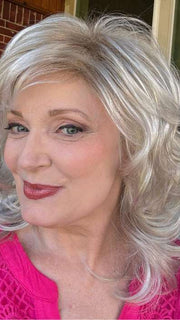 Mel B. @mels.be.ageless wearing TRESS by RAQUEL WELCH WIGS in color R23S GLAZED VANILLA | Cool Platinum Blonde with Almost White Highlights

