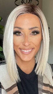 Nichole @nichole.alee wearing CURRENT EVENTS by RAQUEL WELCH WIGS in color RL16/22SS SHADED ICED SWEET CREAM | Pale Blonde with Slight Platinum Highlighting with Dark Roots

