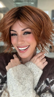 ROXIE wearing JOSS by RENE OF PARIS in SHADED-AMBER | Coppery Blonde and Red Blend with Dark Amber Brown Roots