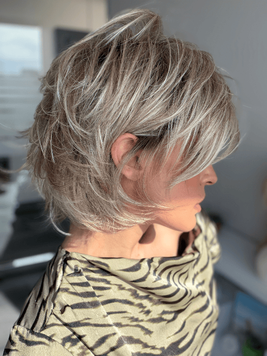 Model is wearing SKY in EXCLUSIVE COLOR ARABIAN SAND | Neutral Chocolate Brown Roots fade into a Neutral Blonde Base, blended with Sandy, Chestnut, Golden, and Honey Blondes, with Soft Creamy Blonde Highlights and Face-Framing Lowlights
