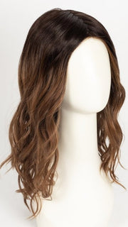 RL2/31OM | Black blend from the roots to midlength that transition into a medium light auburn ombré from midlength to the ends