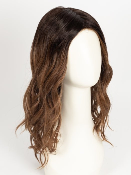 RL2/31OM | Black blend from the roots to midlength that transition into a medium light auburn ombré from midlength to the ends