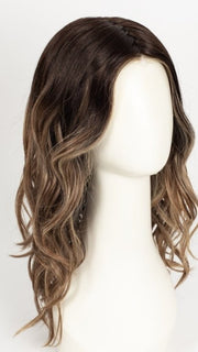 RL4/15OM | Dark brown blended roots that transition into a natural blonde ombré from midlength to the ends