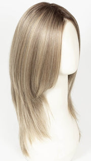 SPARKLING CHAMPAGNE R | Medium Ash Brown roots transition into Shimmering Champagne Blonde characterized by Pale Golden Hues with subtle Ivory and Platinum undertones reminiscent of a sparkling glass of bubbly