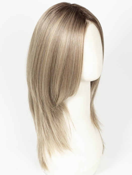 SPARKLING CHAMPAGNE R | Medium Ash Brown roots transition into Shimmering Champagne Blonde characterized by Pale Golden Hues with subtle Ivory and Platinum undertones reminiscent of a sparkling glass of bubbly