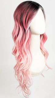 Model is wearing BUBBLEGUM BABE | Dark roots transition into a soft raspberry shade and gradually pales to soft pastel ends. 