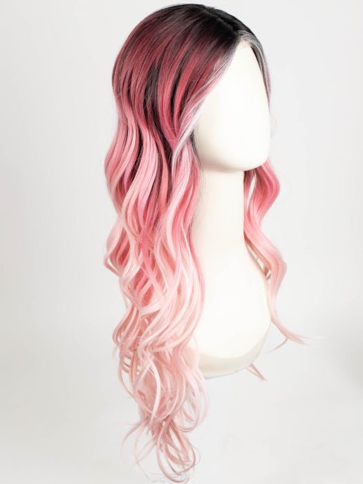 Model is wearing BUBBLEGUM BABE | Dark roots transition into a soft raspberry shade and gradually pales to soft pastel ends. 