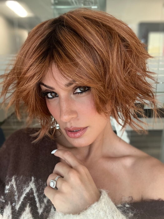 ROXIE wearing JOSS by RENE OF PARIS in SHADED-AMBER | Coppery Blonde and Red Blend with Dark Amber Brown Roots