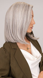 Roxie wearing DAVINA by RENE OF PARIS in SLATE-CHOCOLATE-SPLIT | Grey base with Chunky Chocolate, Pale, Mid-Gray Highlights, and a Rich Chocolate Root