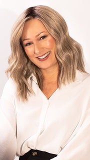 Tanya is wearing BIG SPENDER by RAQUEL WELCH in color RL17/23SS ICED LATTE MACCHIATO | Honey Blonde shaded with Cool Blonde FB MAIN IMAGE