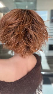 ROXIE wearing JOSS by RENE OF PARIS in SHADED-AMBER | Coppery Blonde and Red Blend with Dark Amber Brown Roots