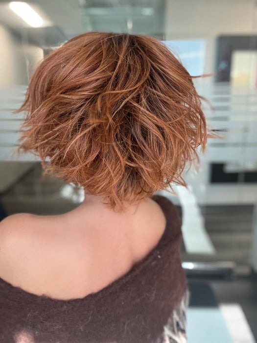 ROXIE wearing JOSS by RENE OF PARIS in SHADED-AMBER | Coppery Blonde and Red Blend with Dark Amber Brown Roots