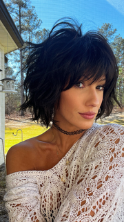 Jenna Fail @jenna_fail wearing BREEZY WAVE CUT by HAIRDO in color R4 MIDNIGHT BROWN | Darkest Brown