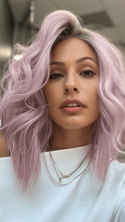 Roxie @thelovelyroxx wearing BIG SPENDER by RAQUEL WELCH WIGS in color PINK | Dusty Pink with a Darker Root