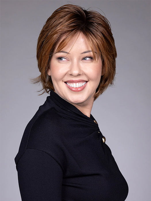 Model is wearing MIXED BERRY R | A bold, berry-inspired red with deep auburn tones and soft rooting for a natural regrowth effect.