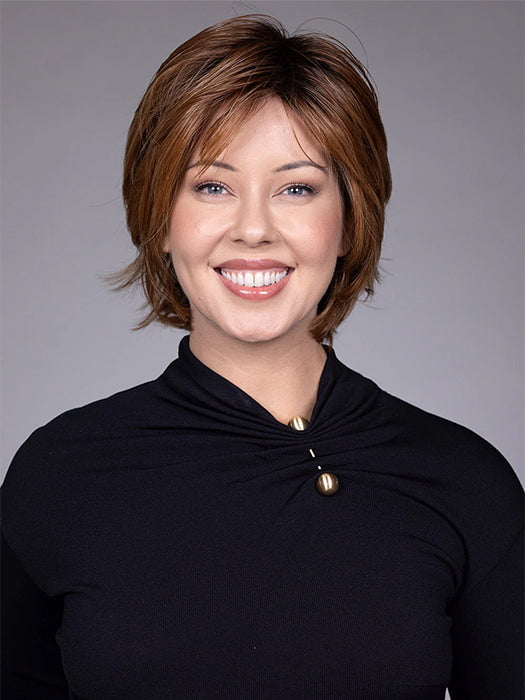 Model is wearing MIXED BERRY R | A bold, berry-inspired red with deep auburn tones and soft rooting for a natural regrowth effect.